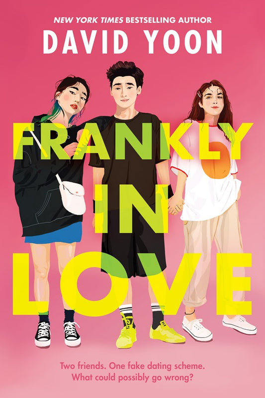 Book cover of 'Frankly In Love' by David Yoon with a young Asian man in shorts flanked by one young Asian woman in a skirt and a young White woman holding his hand on a pink background